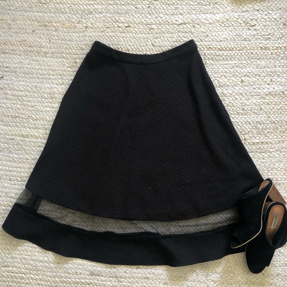 Mid length black skirt sz M